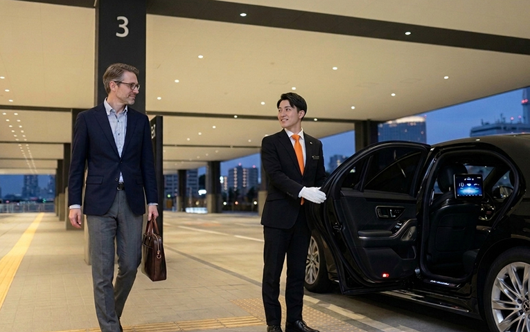 Our planner waiting with the vehicle at Narita Airport
