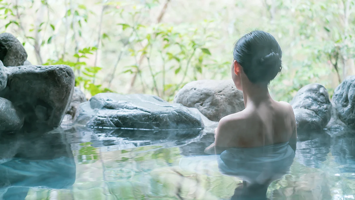 Guests enjoying a private hot spring (onsen) experience.